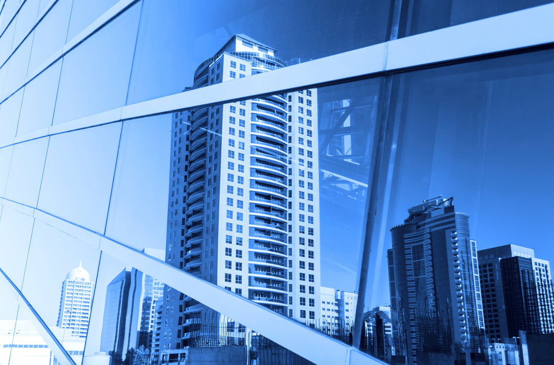 Commercial window tint reflective glare and heat control