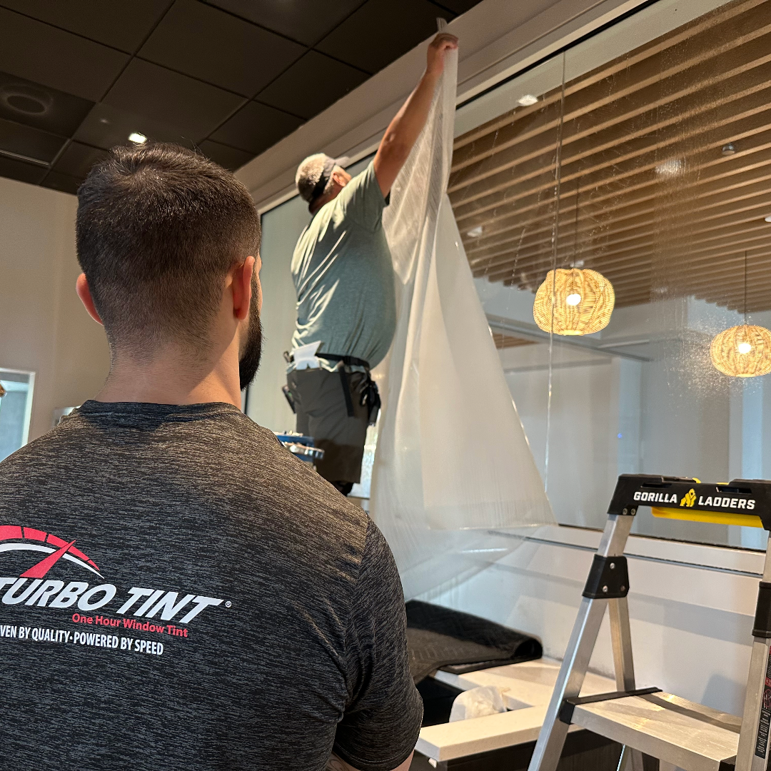 window tinting with a ladder decorative protective privacy conference room